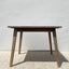 Sleek Oak Square Dining Table